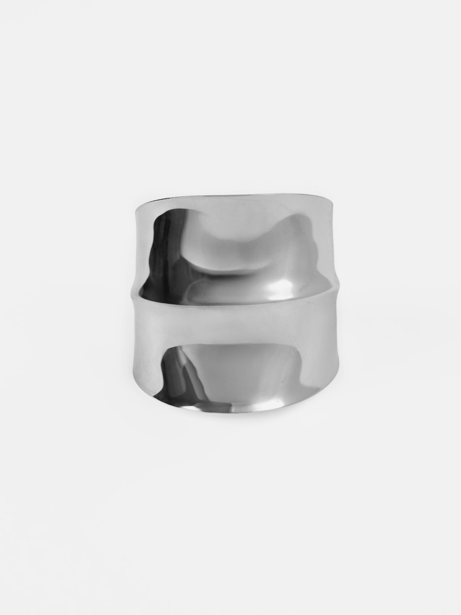 Wide curved metal bracelet