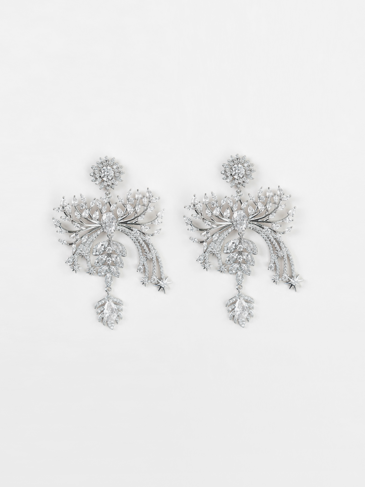 Intricate stud earrings with different-sized stones