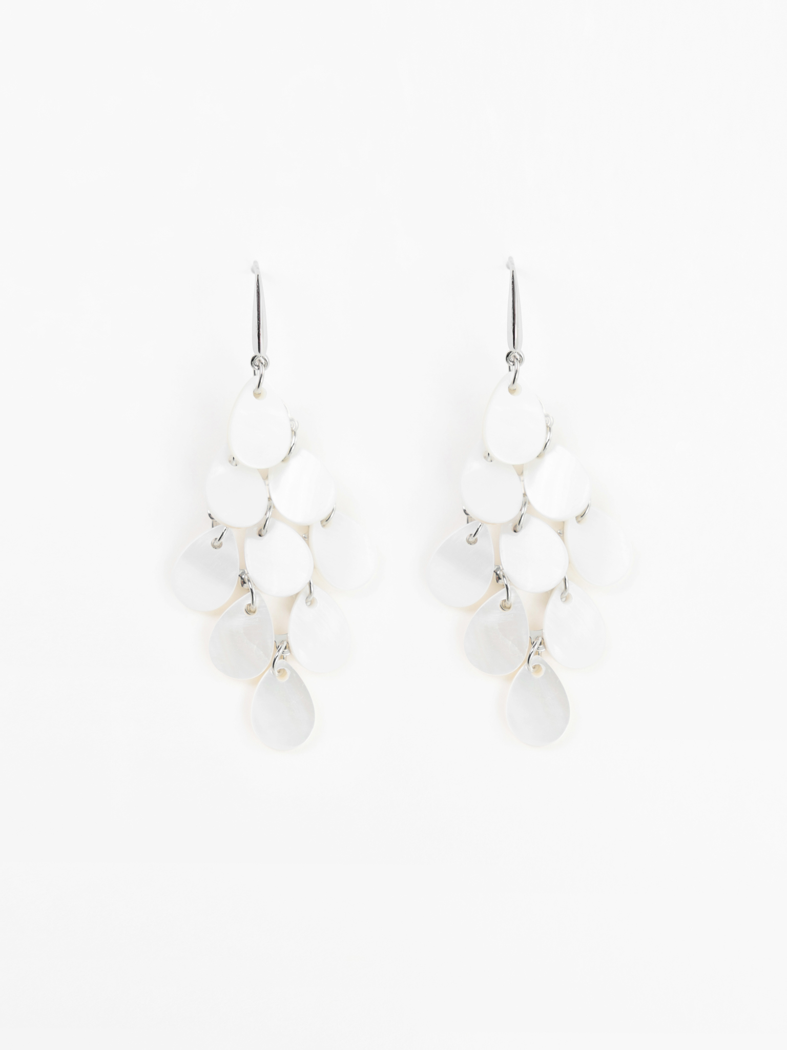 Stud earrings with pearl pendants