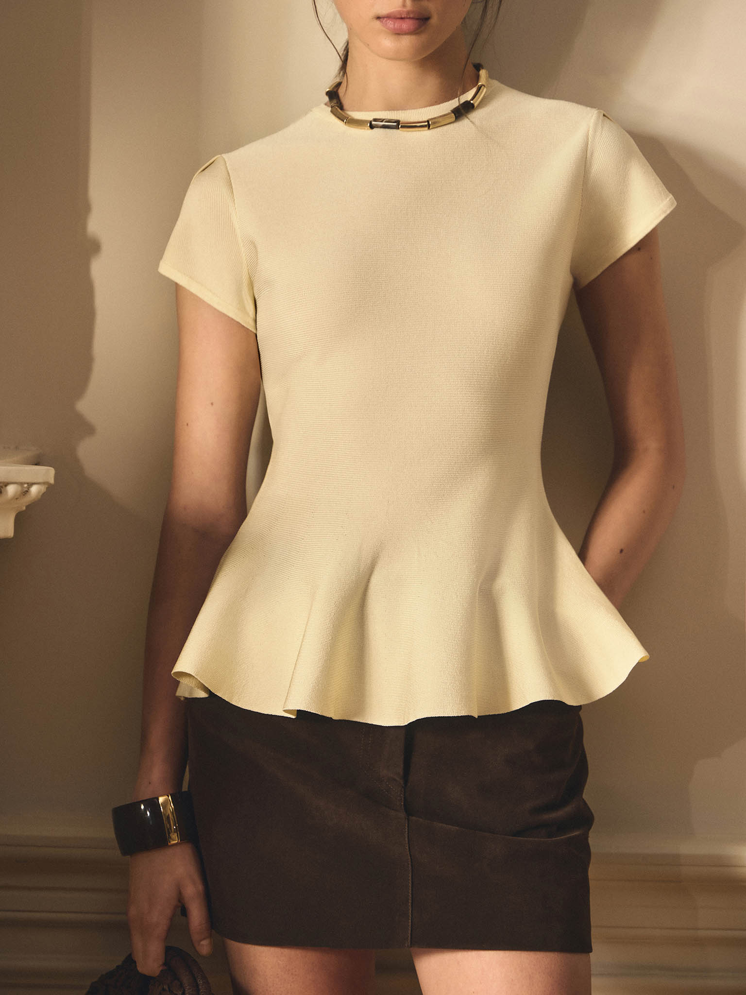 Viscose top with short sleeves and peplum at the waist