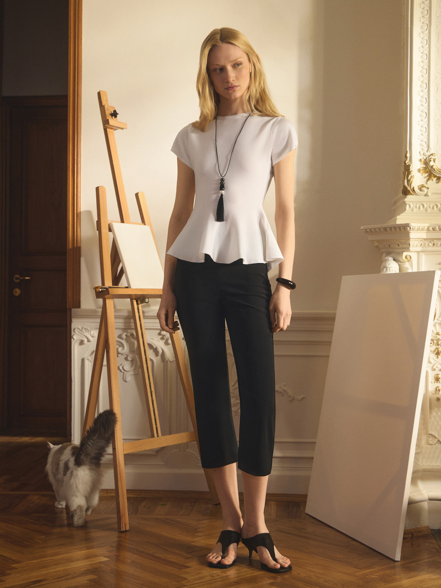 Viscose top with short sleeves and peplum at the waist