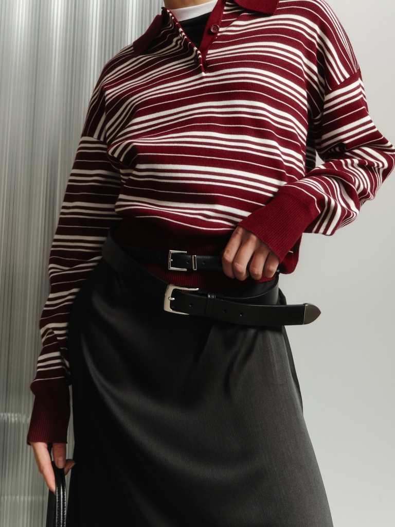 Leather belt with silver tip