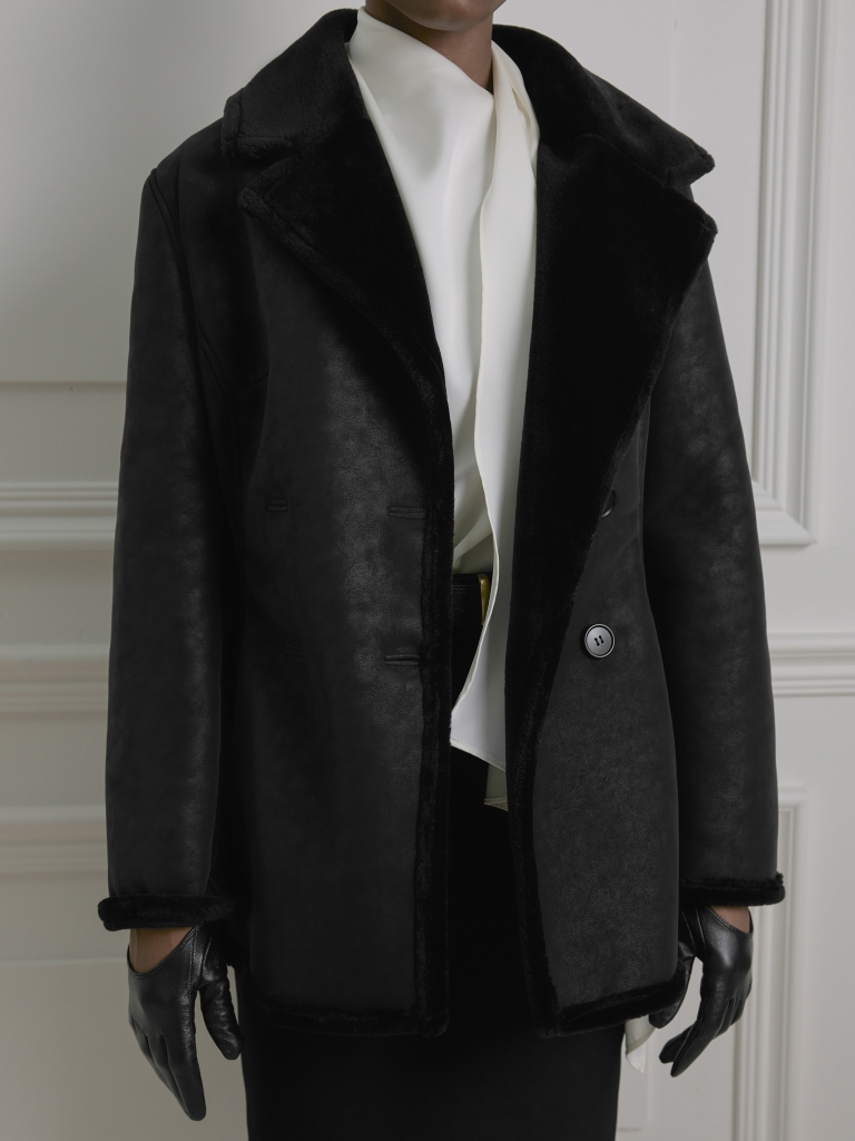 Double-breasted mini shearling coat