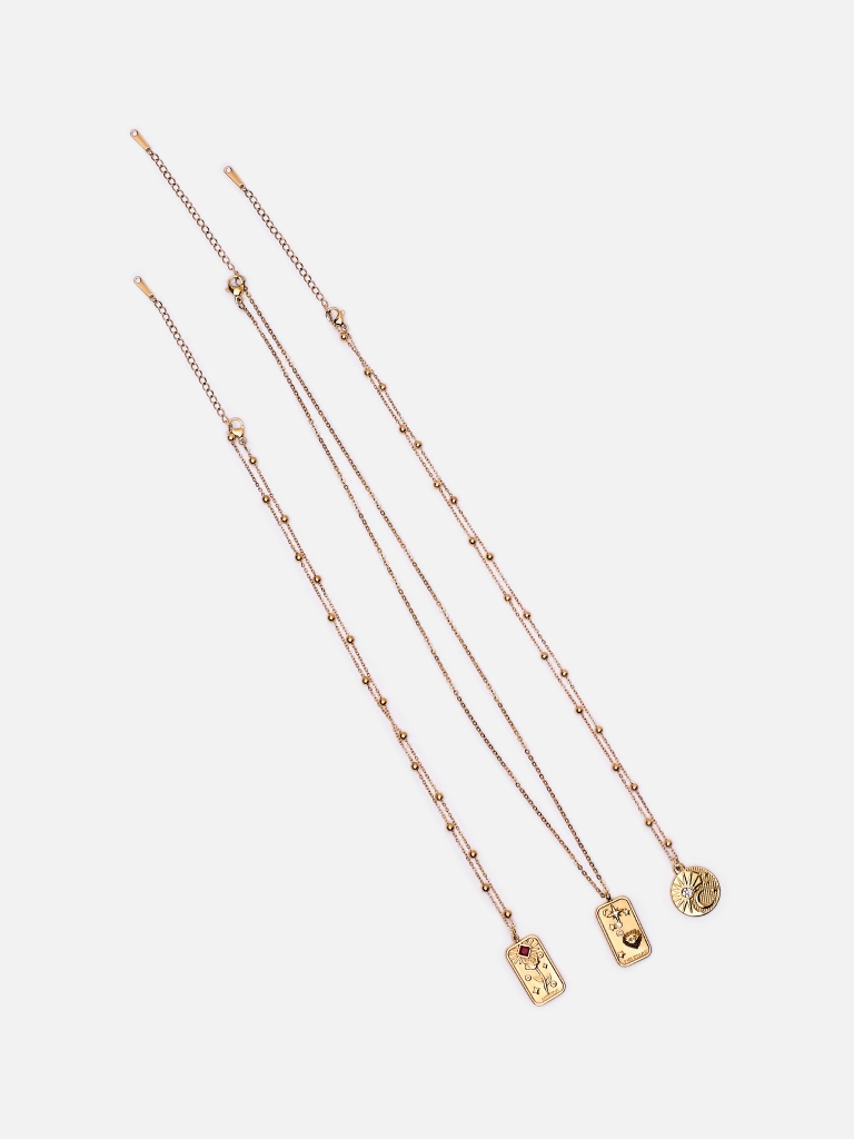 Set of three necklaces with large pendants