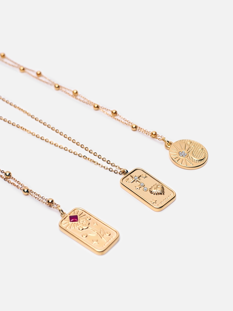 Set of three necklaces with large pendants