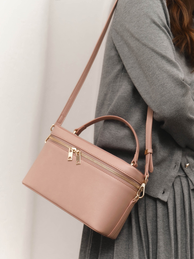 Cylindryczna torba z ekoskóry z wąskim paskiem