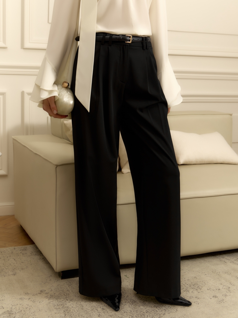 Loose suiting trousers with eco-leather belt