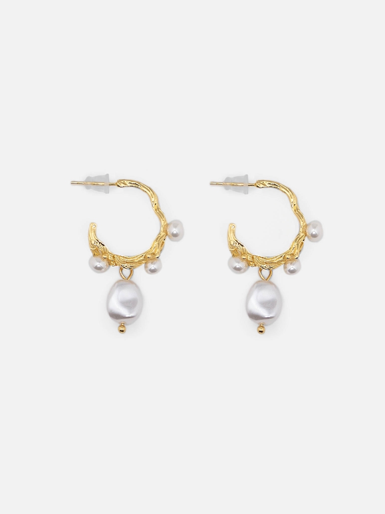 Abstract earrings with pearl decoration