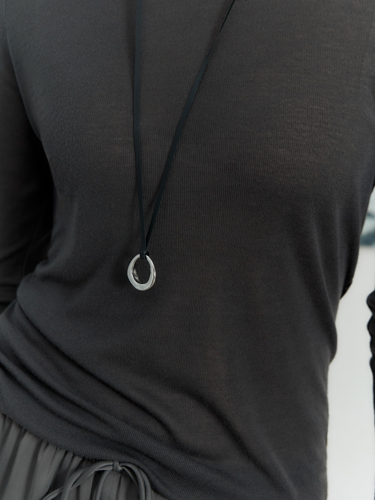 Lace necklace with metal pendant