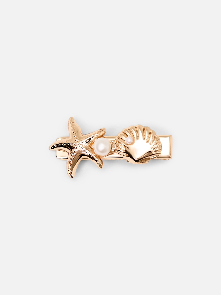 Golden hair clip with marine decor