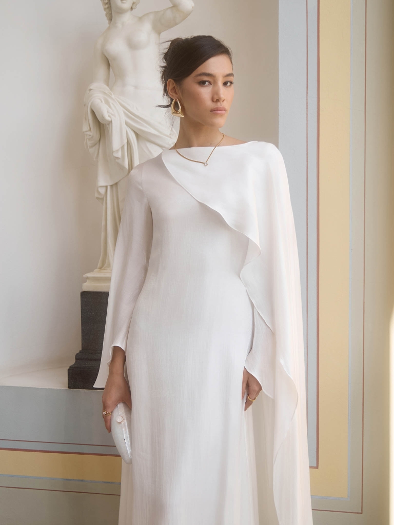 Платье макси из фактурной ткани с кейпом на одно плечо