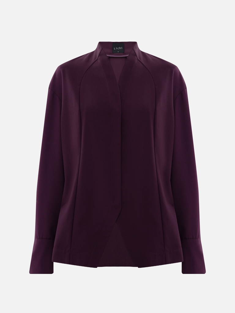 Complex cut shirt with hidden button fastening