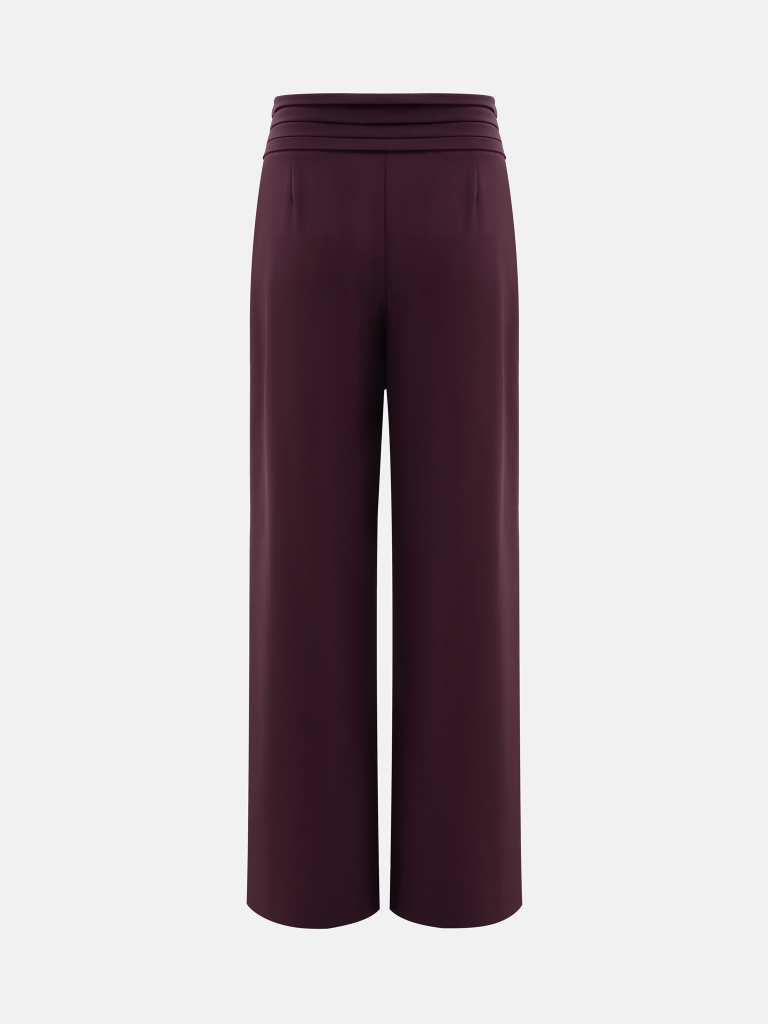 Loose trousers with wide draped belt