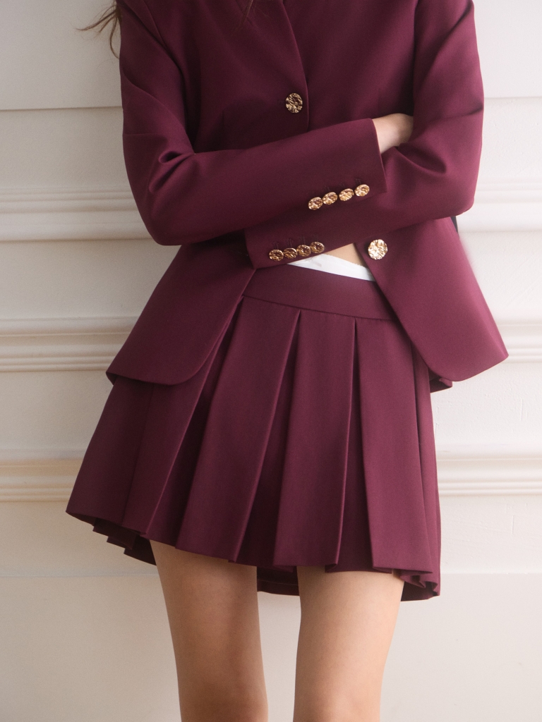Mini skirt with waist pleats