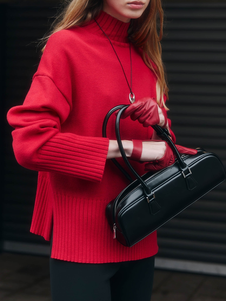 Loose smooth knitted jumper with ribbed detailing