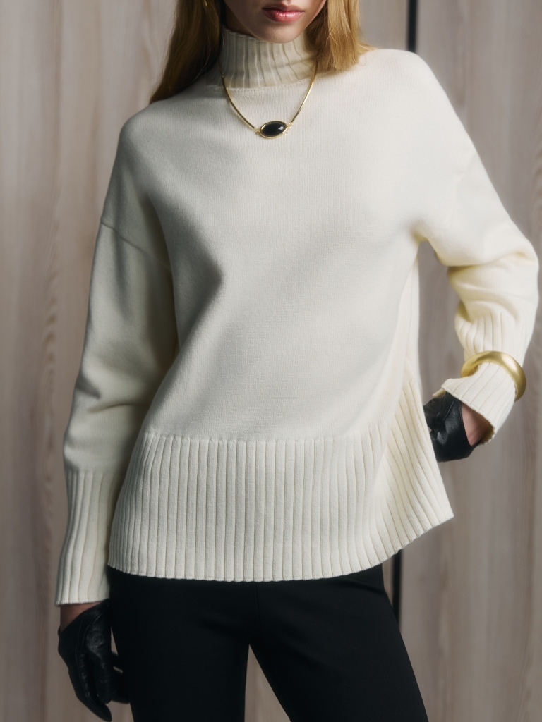 Loose smooth knitted jumper with ribbed detailing