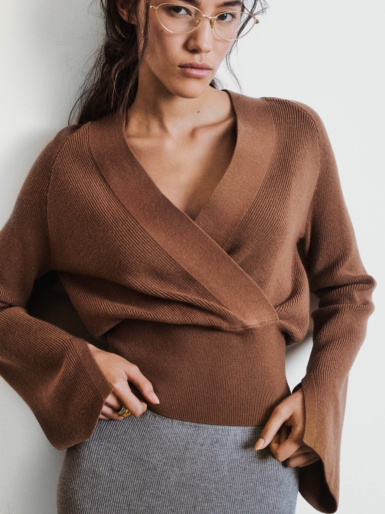 Knitted jumper with wrap imitation 