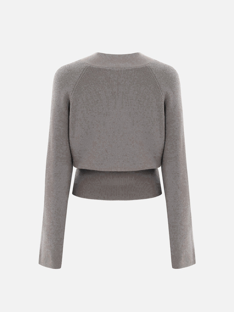 Knitted jumper with wrap imitation 