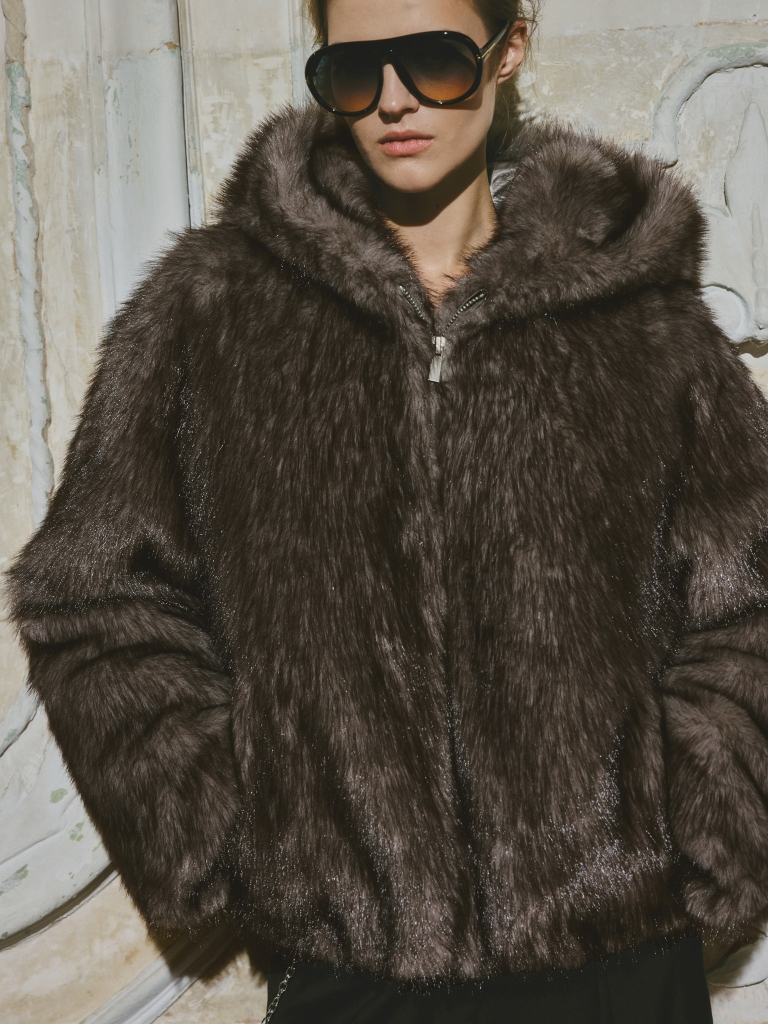 Short eco-fur coat with a zip and a hood