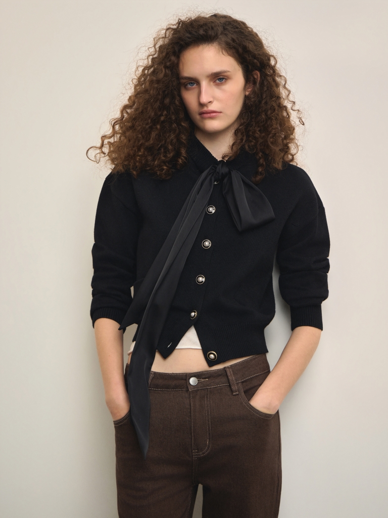 Knitted cardigan with a satin bow
