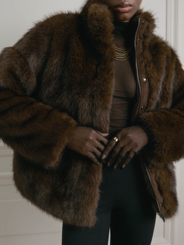 Short eco-fur coat with zip fastening and stand-up collar