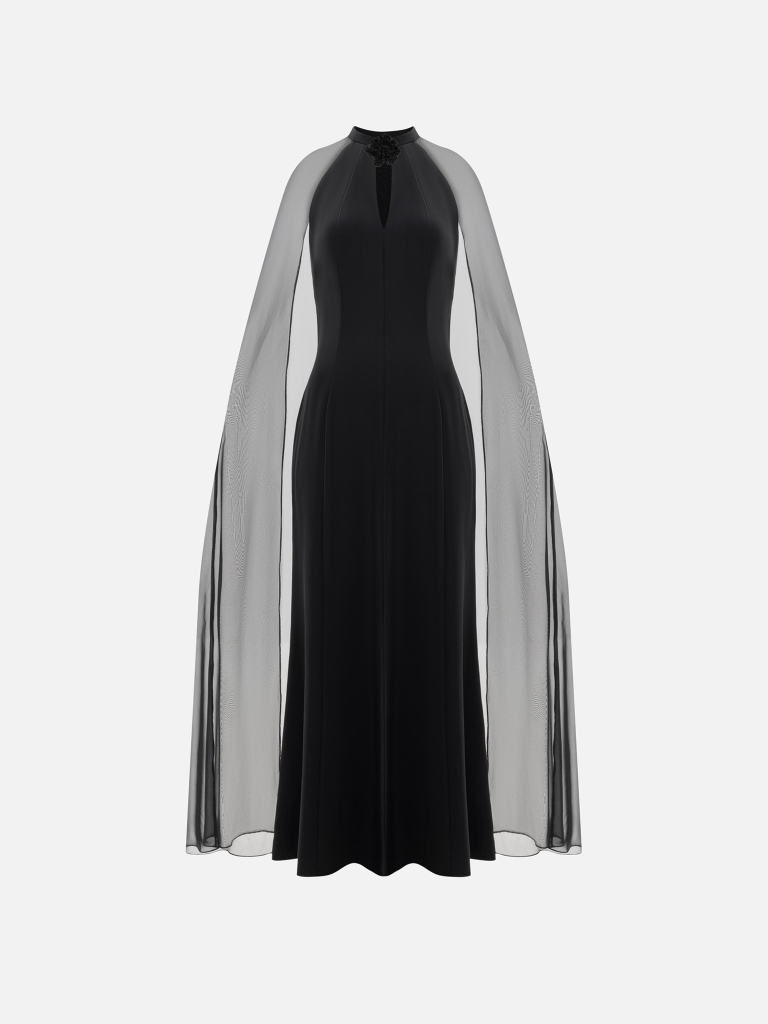 Maxi dress with flower on the collar and a light cape