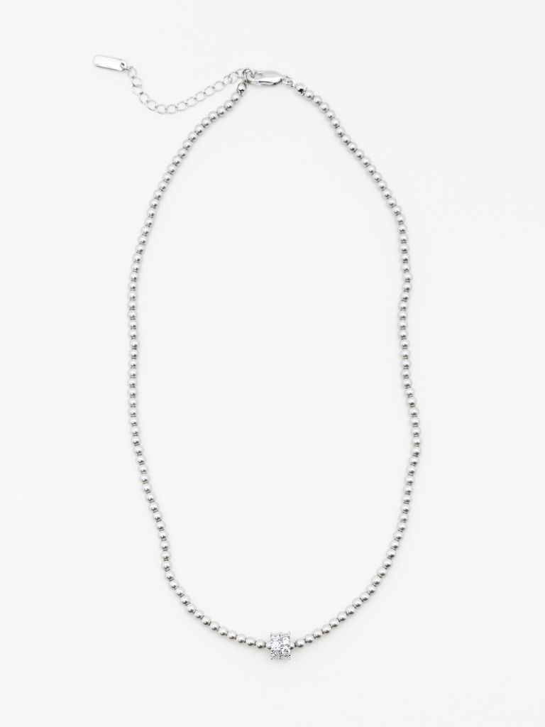 Серебристое колье из круглых блоков с крупным кристаллом