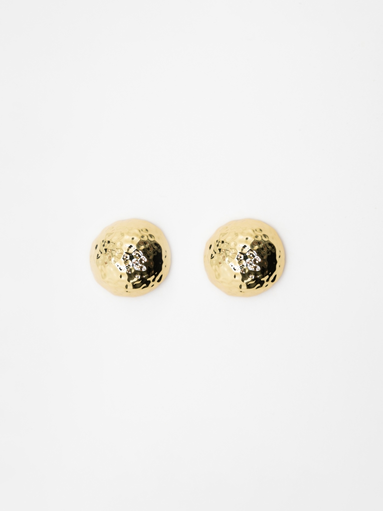 Round stud earrings in textured metal