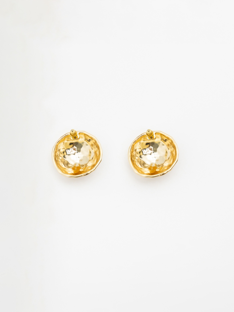 Round stud earrings in textured metal