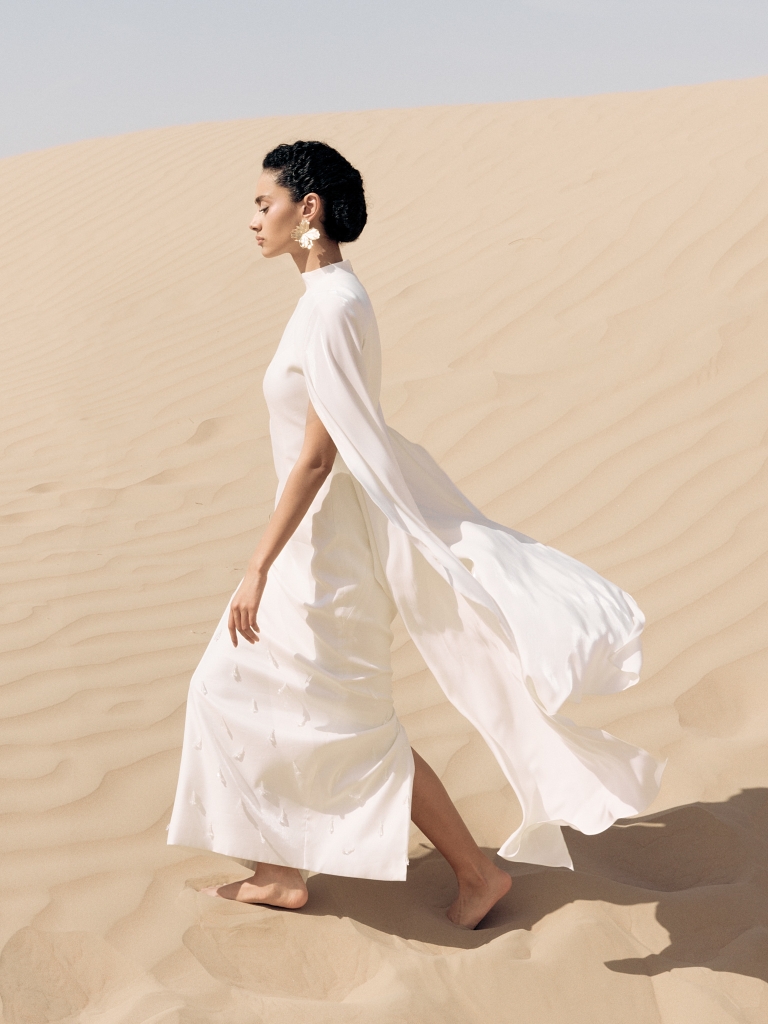 Maxi dress with loose sleeves and skirt embellishment