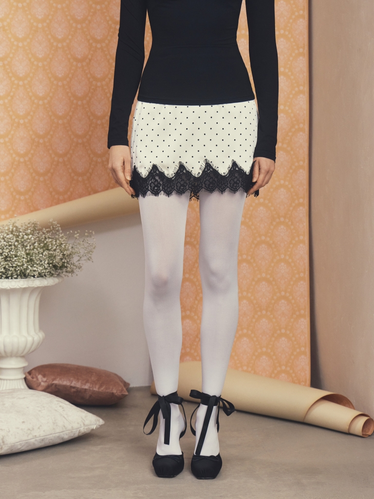 Polka dot mini skirt with lace trim