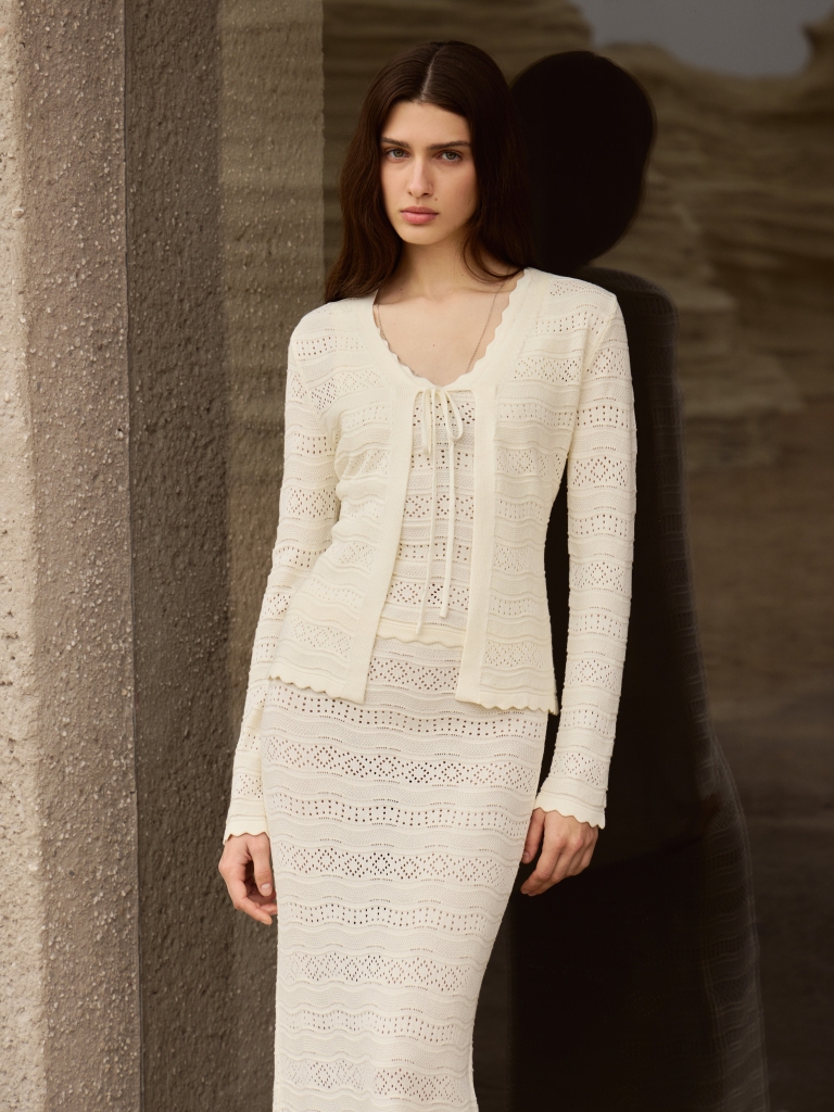 Openwork knitted cardigan with ties