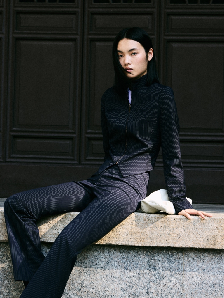 Fitted striped jacket with zip fastening