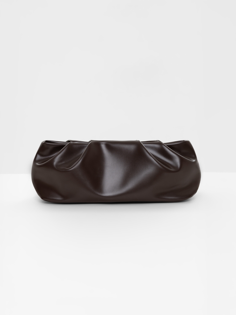 Voluminous eco-leather clutch bag with a thin strap
