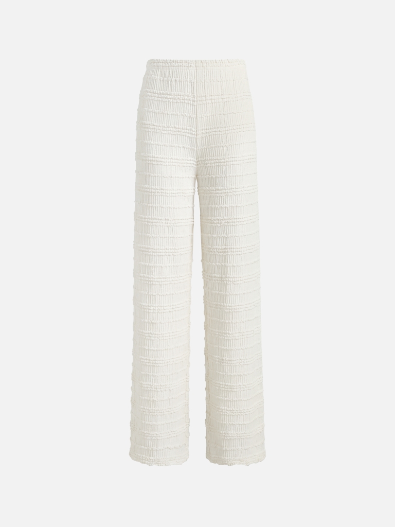 Loose-fitting trousers in crinkled fabric
