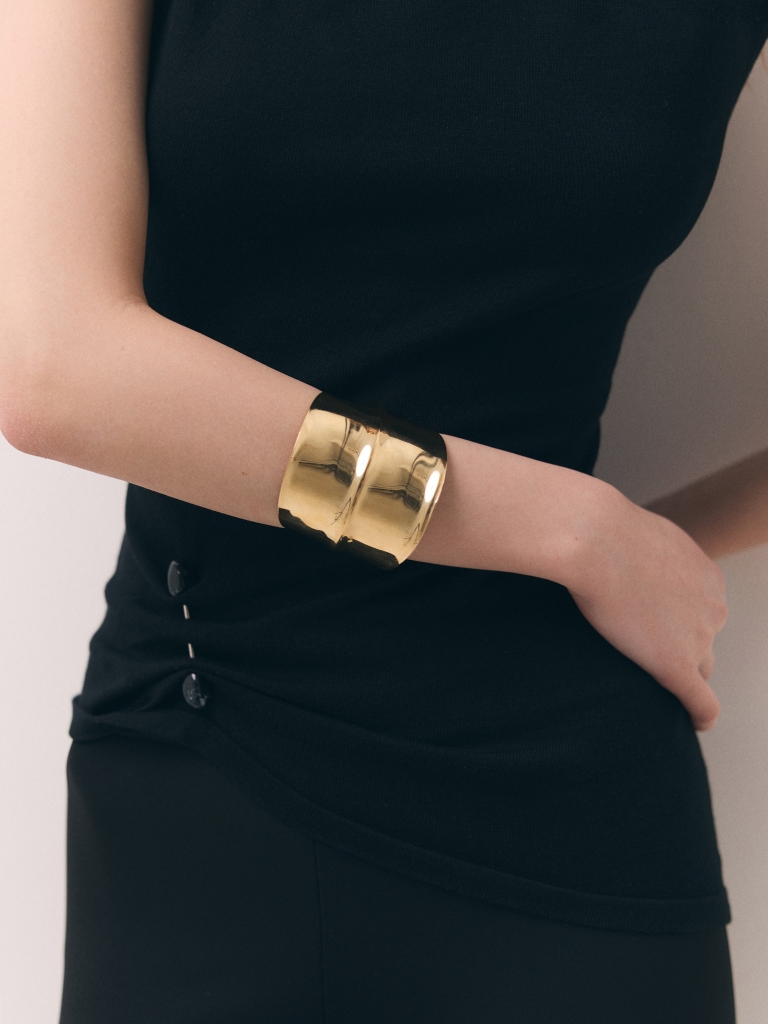 Wide curved metal bracelet