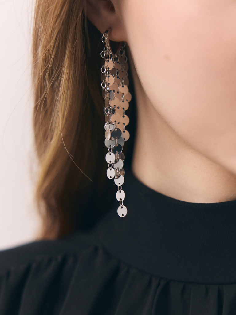 Silvertone earrings with pendant decor