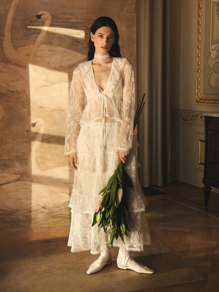 Floor-length lace cape with flounces