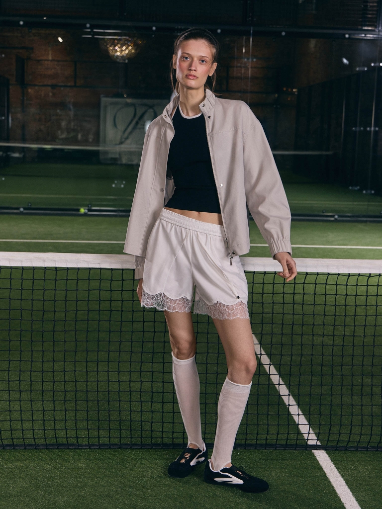 Sports jacket with press stud fastening