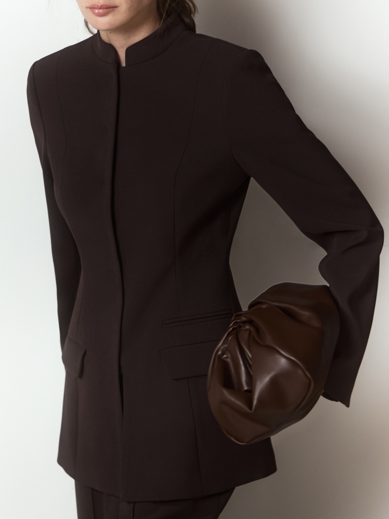 Fitted single-breasted jacket with a hidden fastening
