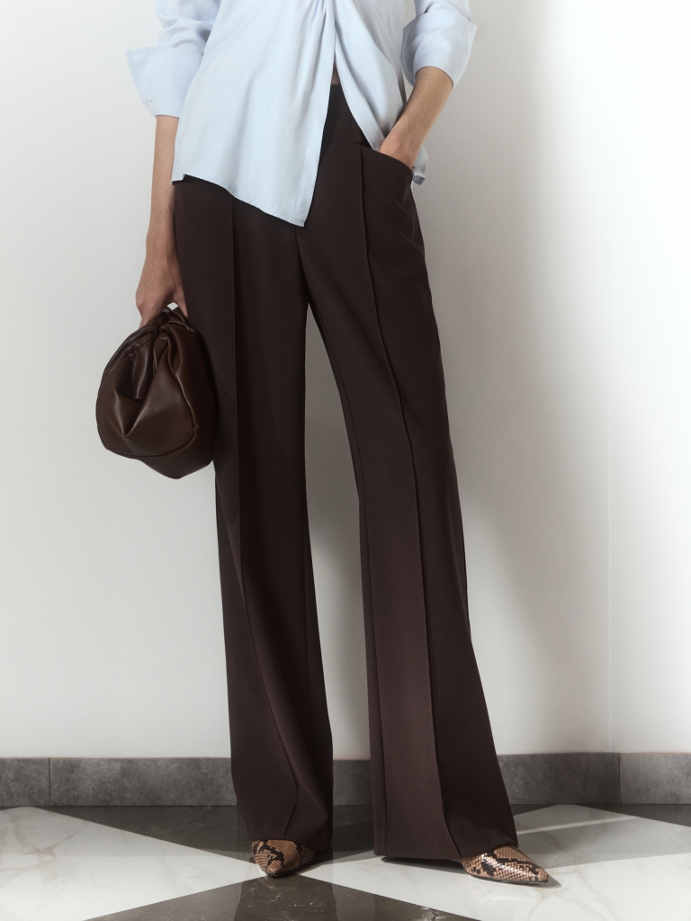 Flared trousers with creases