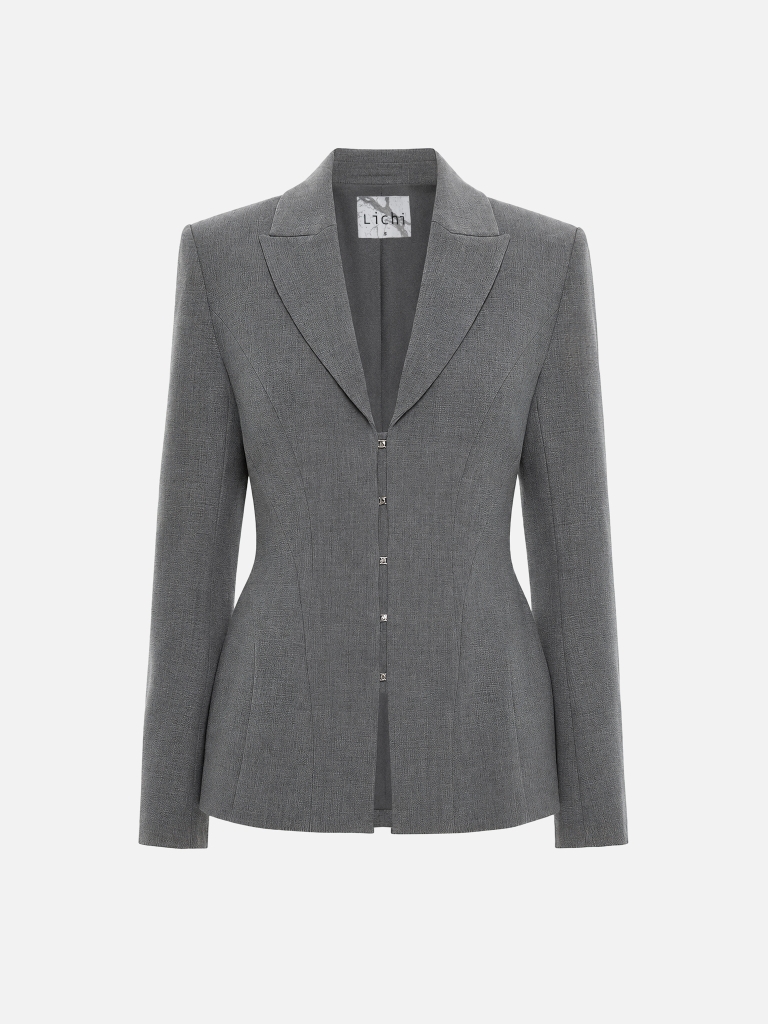 Fitted jacket with voluminous inserts at the hips