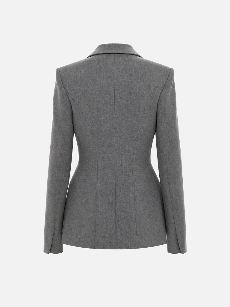 Fitted jacket with voluminous inserts at the hips