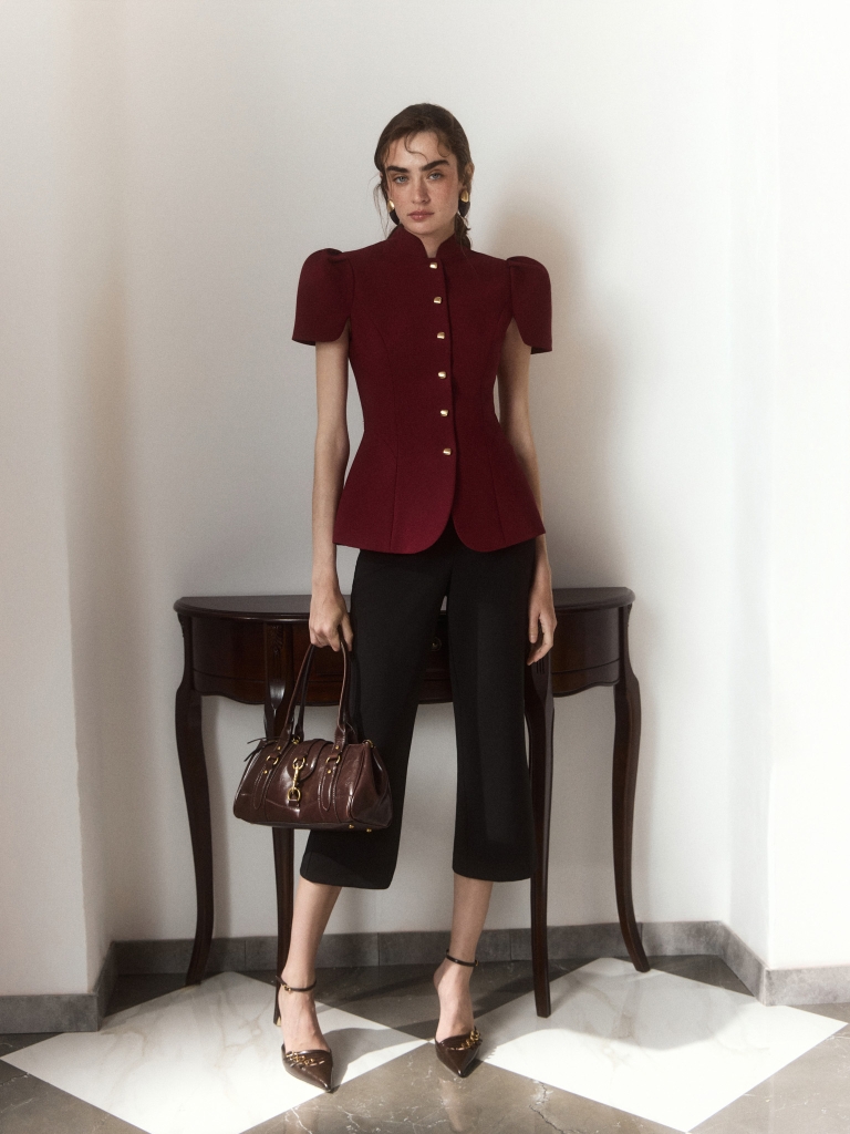Fitted jacket with a stand-up collar and voluminous sleeves