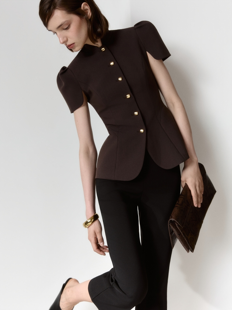 Fitted jacket with a stand-up collar and voluminous sleeves