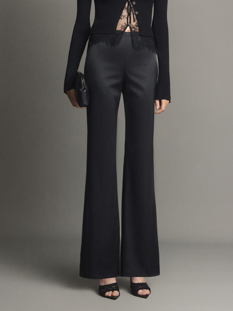 Flared trousers made from heavy fabric, flaring from the knee
