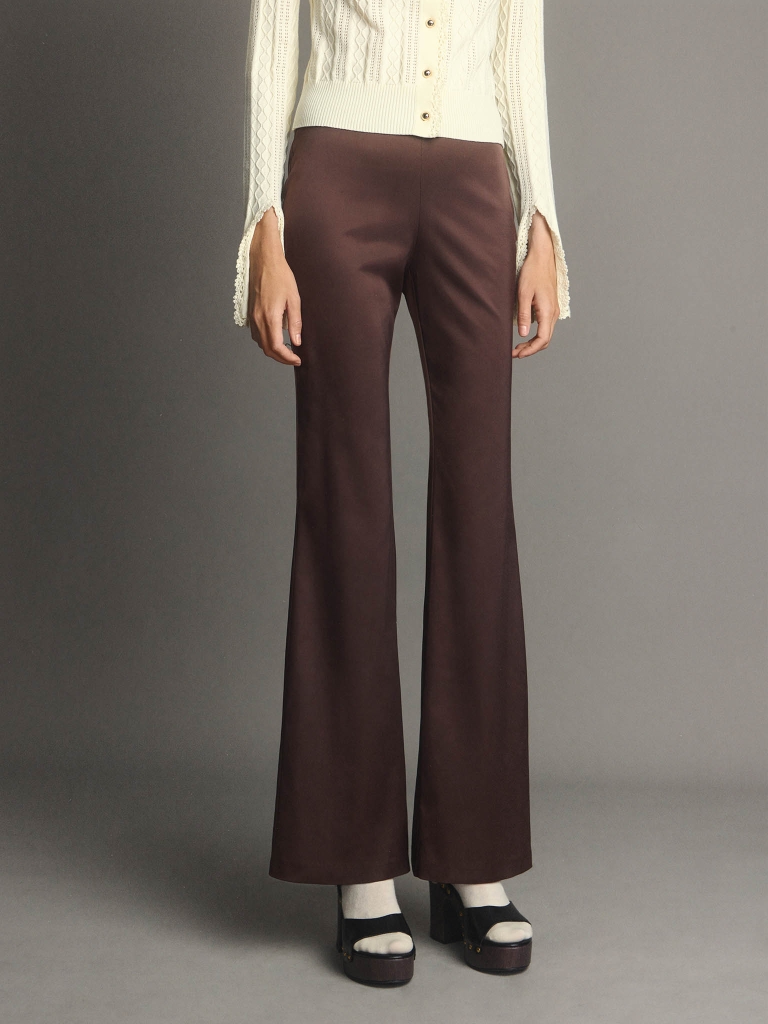 Flared trousers made from heavy fabric, flaring from the knee