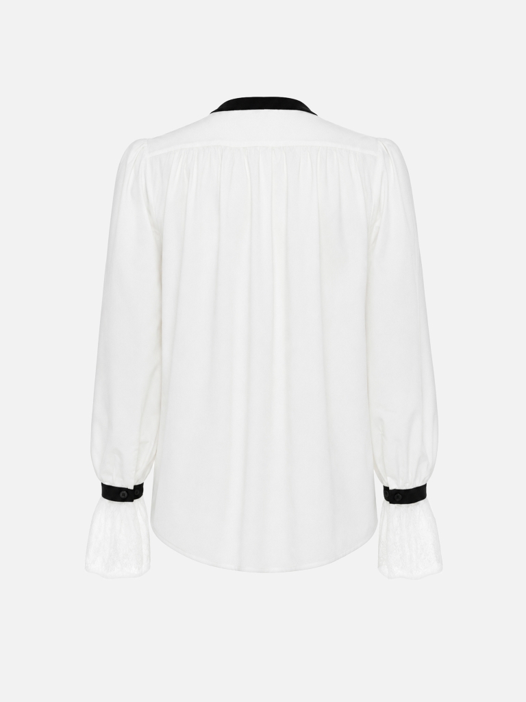 Lightweight blouse with lace detailing and a bow at the collar