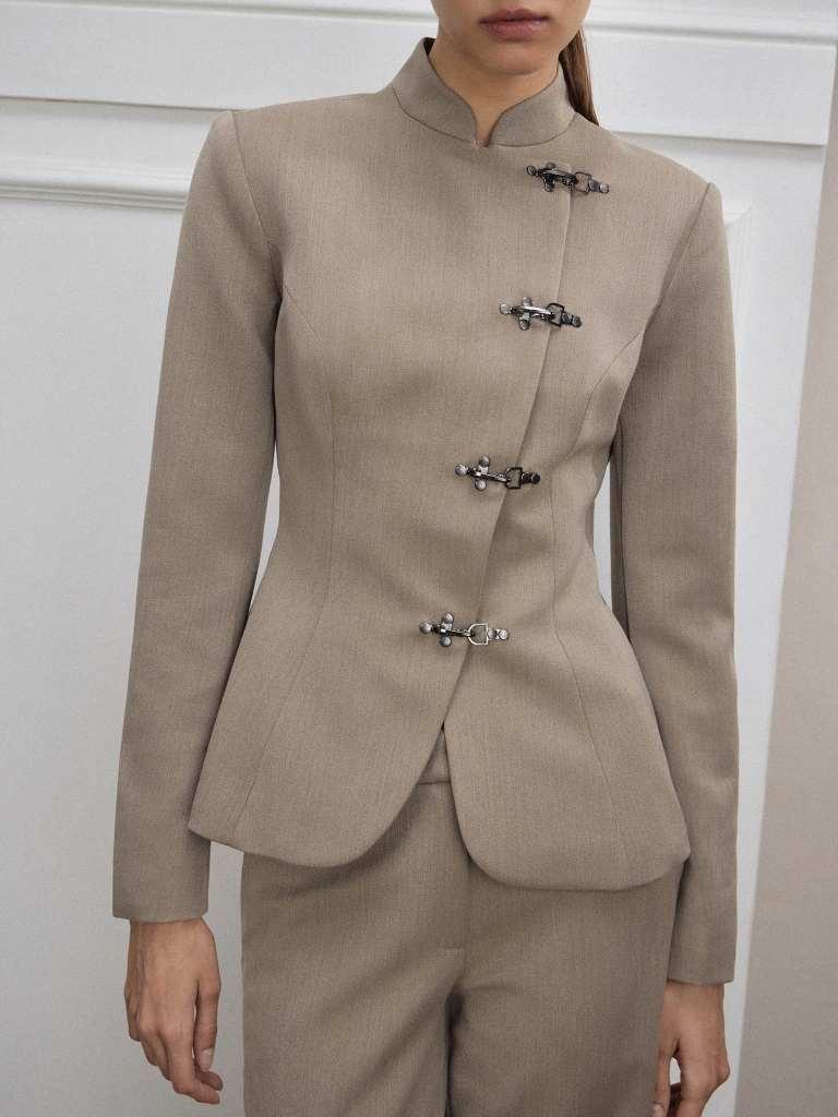 Fitted jacket with metal clasps