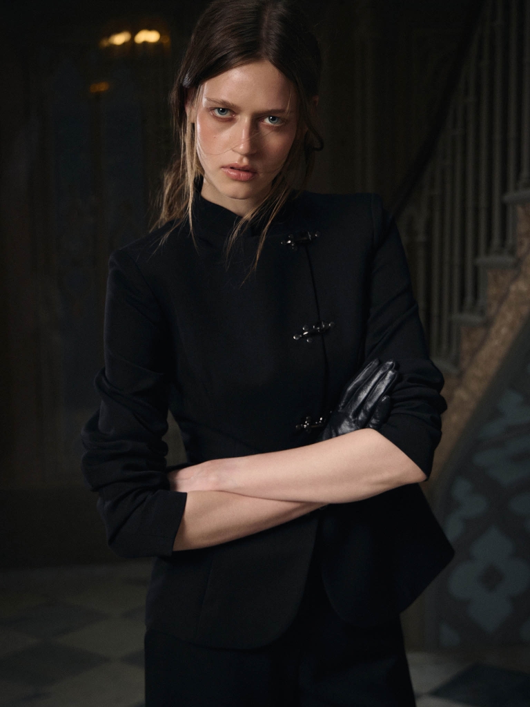 Fitted jacket with metal clasps